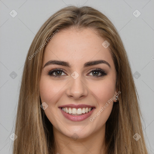 Joyful white young-adult female with long  brown hair and brown eyes