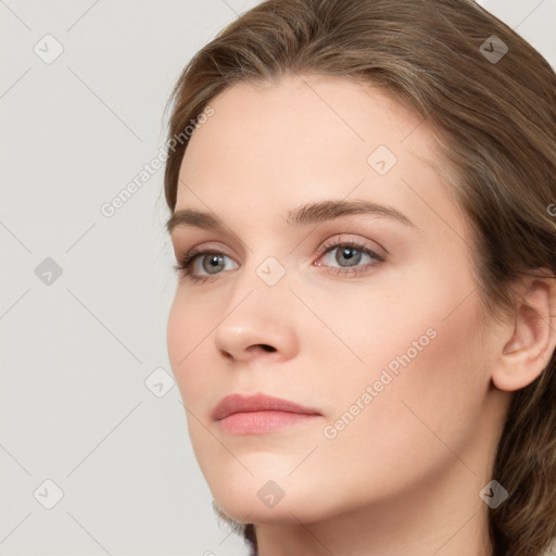 Neutral white young-adult female with long  brown hair and grey eyes