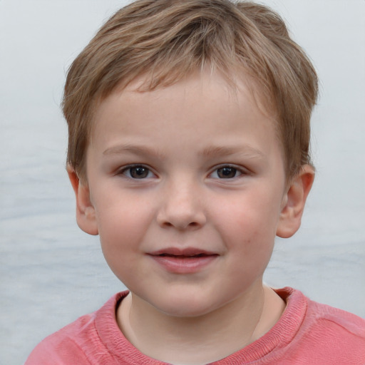 Joyful white child male with short  brown hair and grey eyes