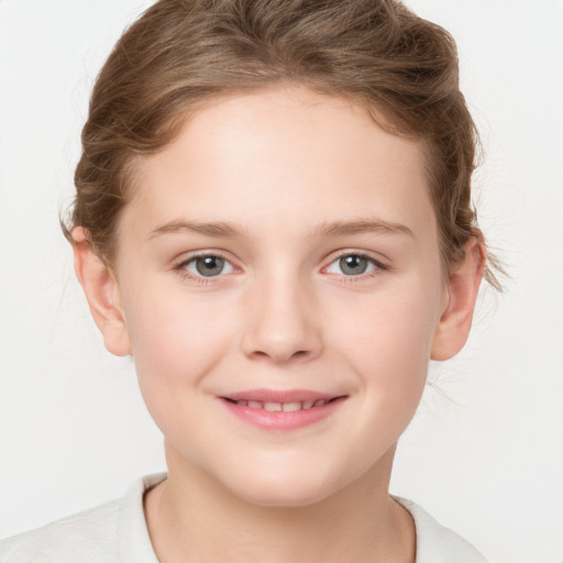 Joyful white child female with medium  brown hair and brown eyes