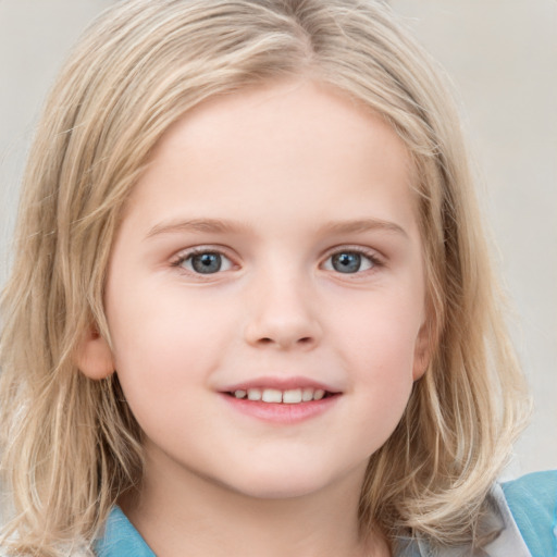 Joyful white child female with medium  brown hair and blue eyes