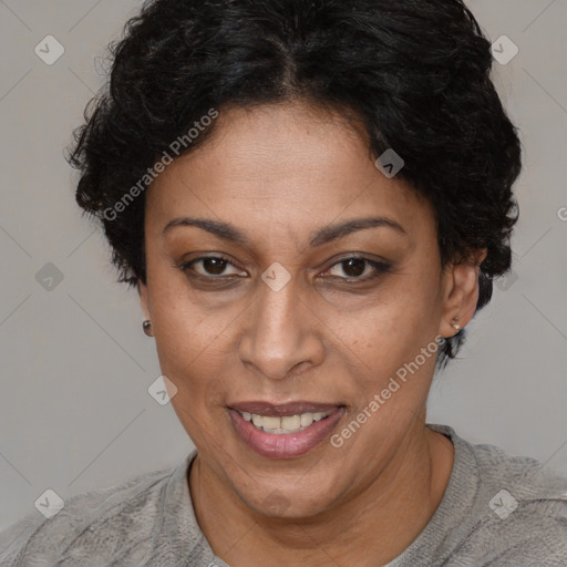 Joyful latino adult female with short  brown hair and brown eyes