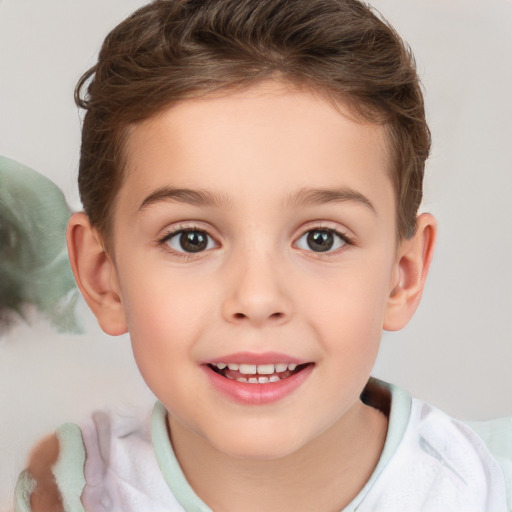 Joyful white child male with short  brown hair and brown eyes