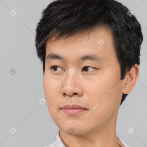 Neutral asian young-adult male with short  black hair and brown eyes