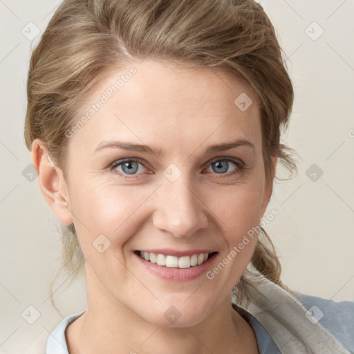 Joyful white young-adult female with medium  brown hair and blue eyes