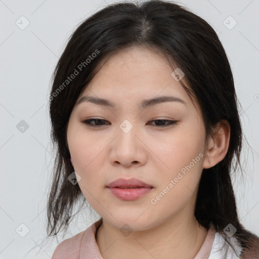 Neutral asian young-adult female with medium  brown hair and brown eyes