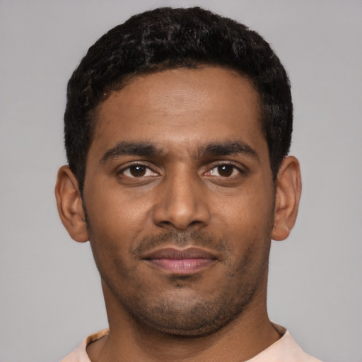 Neutral black young-adult male with short  brown hair and brown eyes