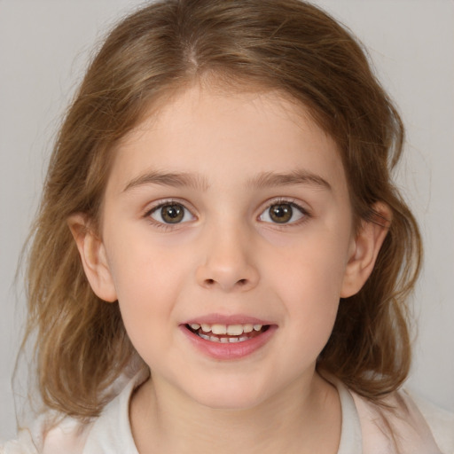 Joyful white child female with medium  brown hair and brown eyes