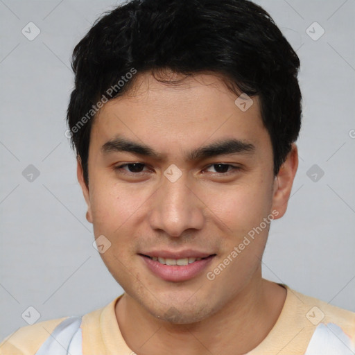 Joyful asian young-adult male with short  brown hair and brown eyes