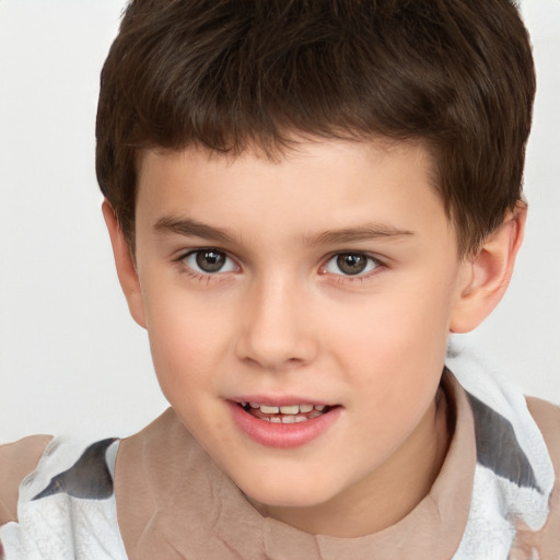 Joyful white child male with short  brown hair and brown eyes