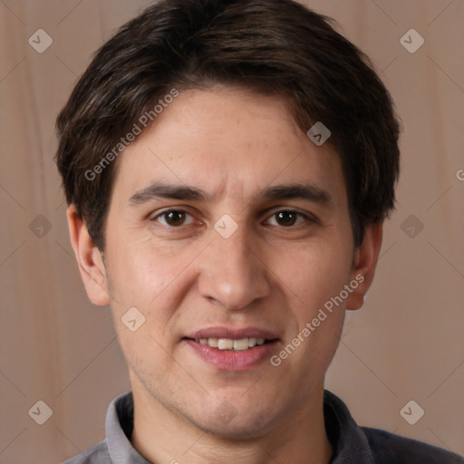 Joyful white young-adult male with short  brown hair and brown eyes