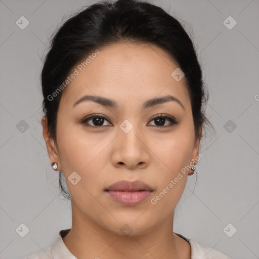 Joyful asian young-adult female with medium  black hair and brown eyes