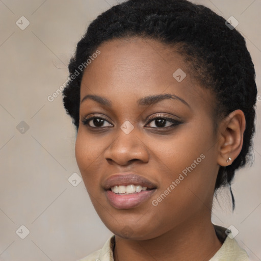 Joyful black young-adult female with medium  black hair and brown eyes