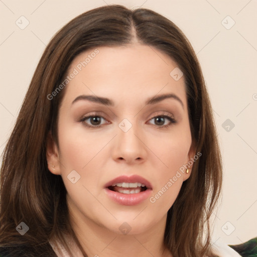 Neutral white young-adult female with long  brown hair and brown eyes