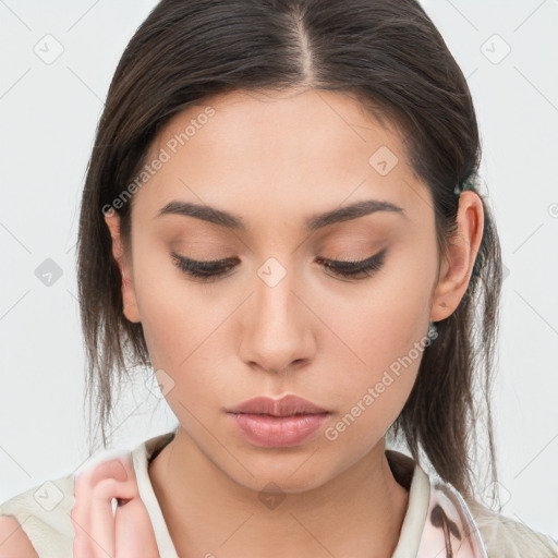 Neutral white young-adult female with medium  brown hair and brown eyes