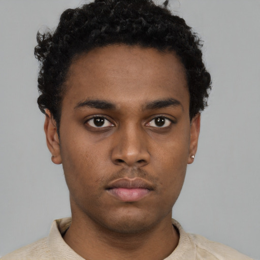 Neutral black young-adult male with short  brown hair and brown eyes