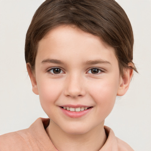 Joyful white child female with short  brown hair and brown eyes