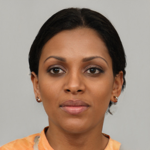 Neutral black young-adult female with short  black hair and brown eyes