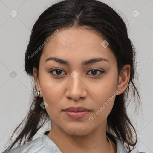 Joyful latino young-adult female with medium  brown hair and brown eyes