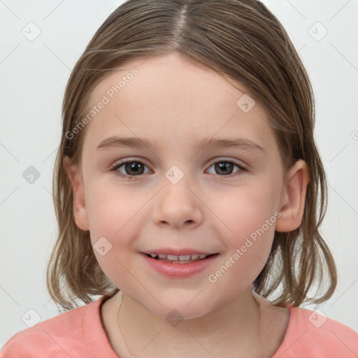 Joyful white child female with medium  brown hair and brown eyes