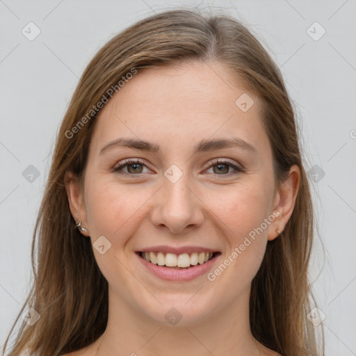 Joyful white young-adult female with long  brown hair and grey eyes