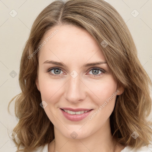 Joyful white young-adult female with medium  brown hair and green eyes