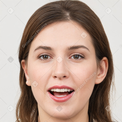 Joyful white young-adult female with long  brown hair and grey eyes