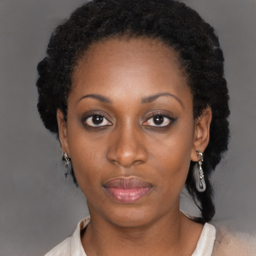 Neutral black young-adult female with short  black hair and brown eyes