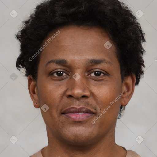 Joyful black young-adult male with short  brown hair and brown eyes