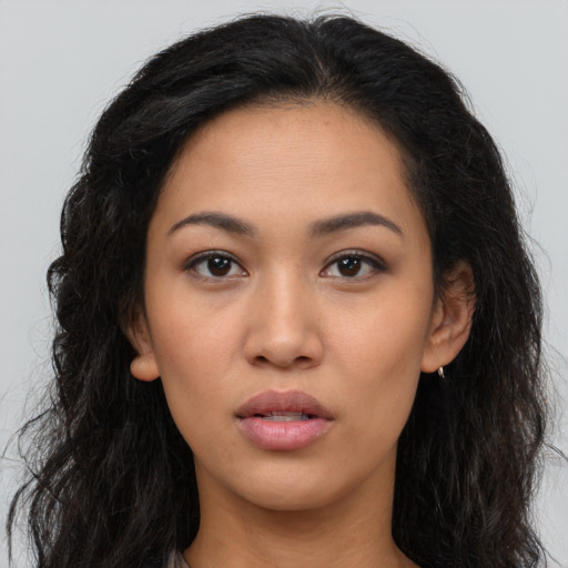 Neutral asian young-adult female with long  brown hair and brown eyes