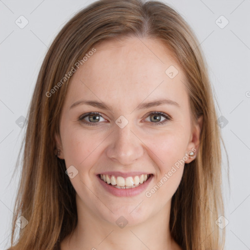 Joyful white young-adult female with long  brown hair and grey eyes