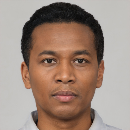 Neutral black young-adult male with short  black hair and brown eyes