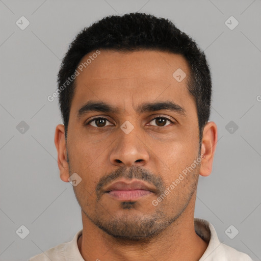 Neutral latino young-adult male with short  black hair and brown eyes