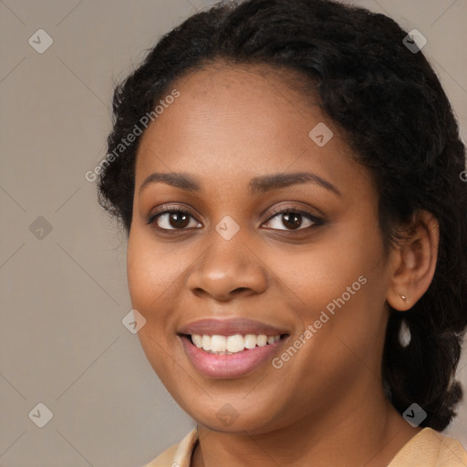 Joyful black young-adult female with medium  black hair and brown eyes