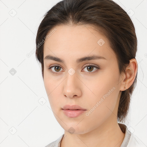 Neutral white young-adult female with medium  brown hair and brown eyes