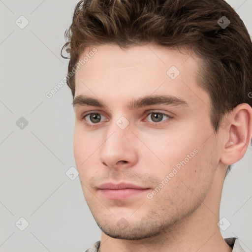 Neutral white young-adult male with short  brown hair and grey eyes