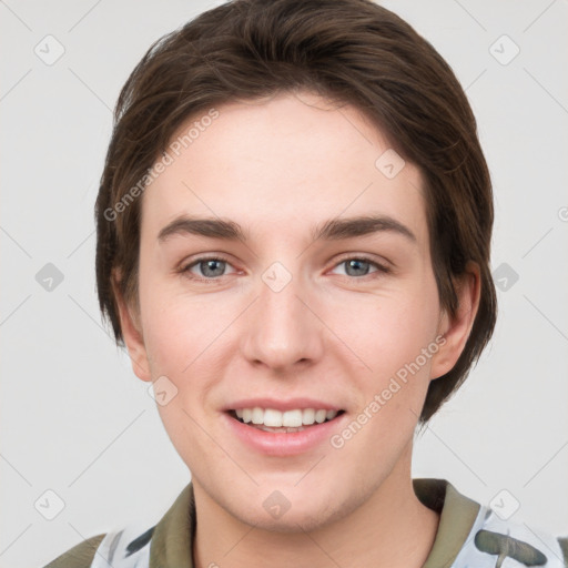 Joyful white young-adult female with short  brown hair and grey eyes