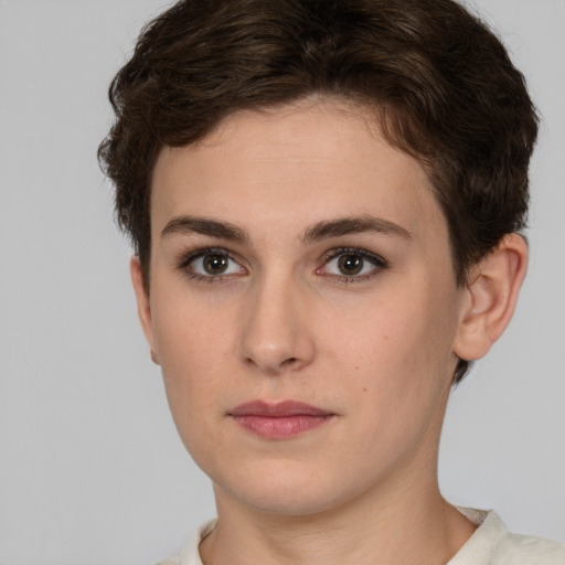 Neutral white young-adult female with short  brown hair and brown eyes