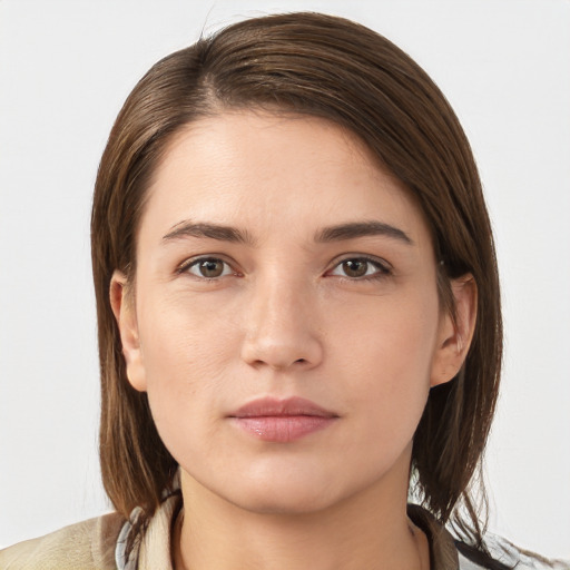 Neutral white young-adult female with medium  brown hair and grey eyes