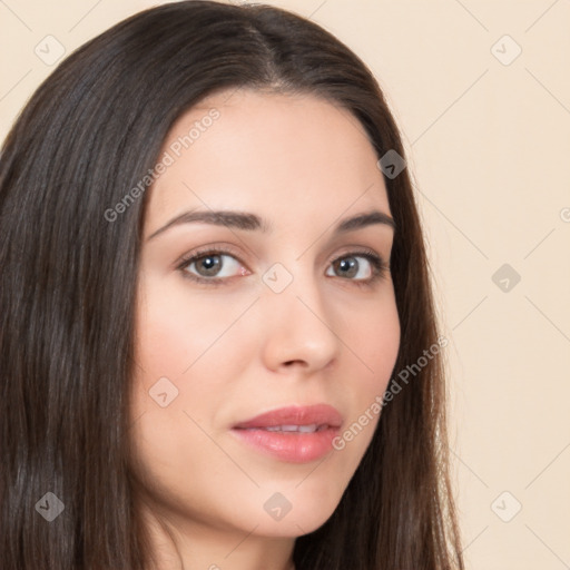 Neutral white young-adult female with long  brown hair and brown eyes