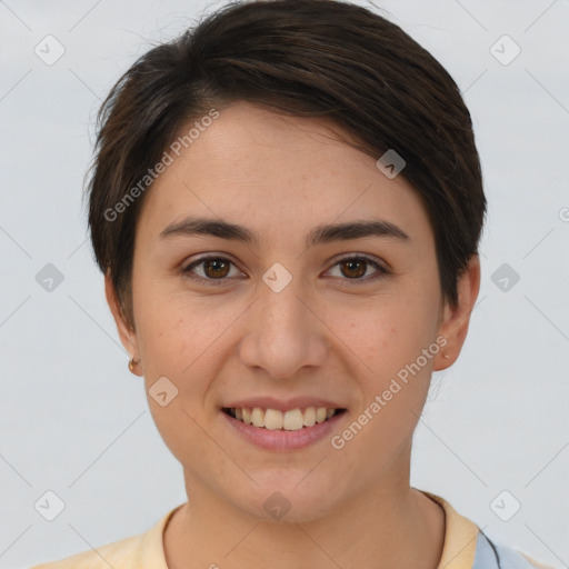 Joyful white young-adult female with short  brown hair and brown eyes