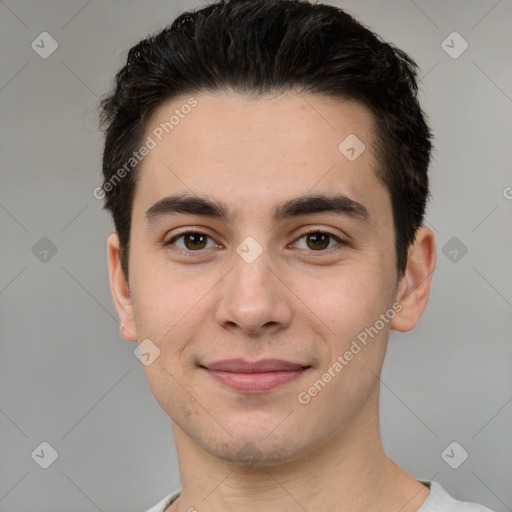 Joyful white young-adult male with short  black hair and brown eyes