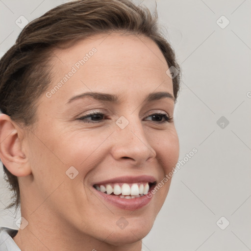 Joyful white young-adult female with short  brown hair and brown eyes