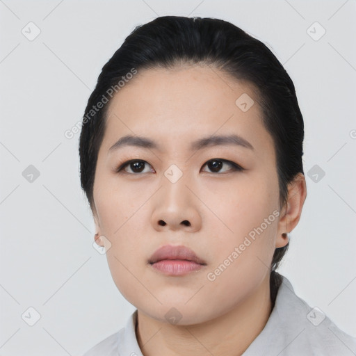 Neutral asian young-adult female with short  black hair and brown eyes