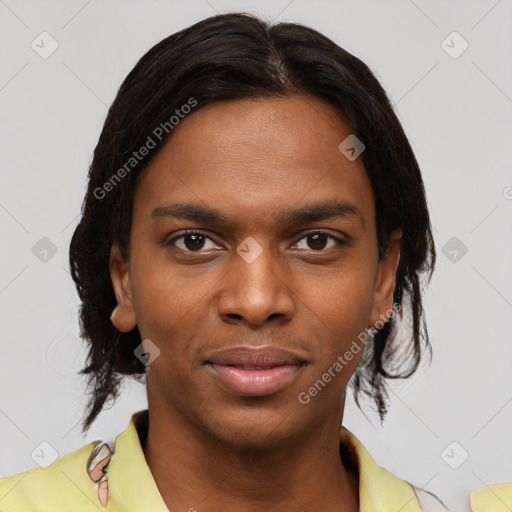 Joyful black young-adult female with medium  brown hair and brown eyes