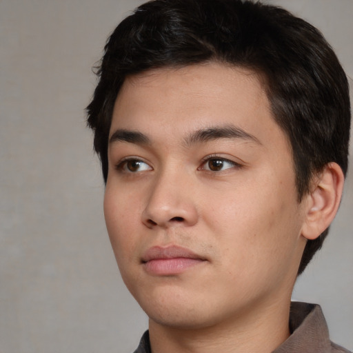 Neutral asian young-adult male with short  brown hair and brown eyes
