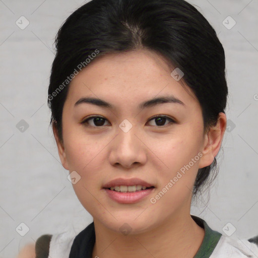 Joyful asian young-adult female with medium  brown hair and brown eyes