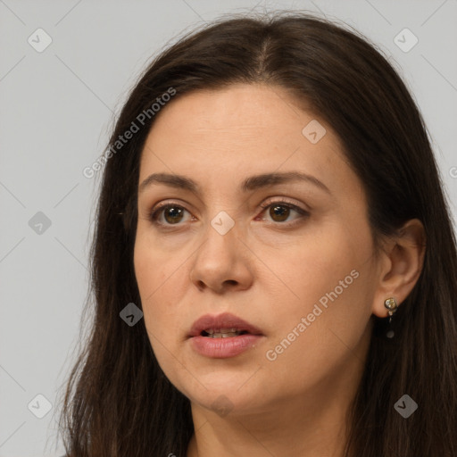 Neutral white young-adult female with long  brown hair and brown eyes