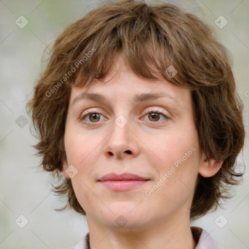 Joyful white young-adult female with medium  brown hair and green eyes