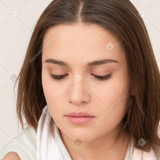 Neutral white young-adult female with long  brown hair and brown eyes